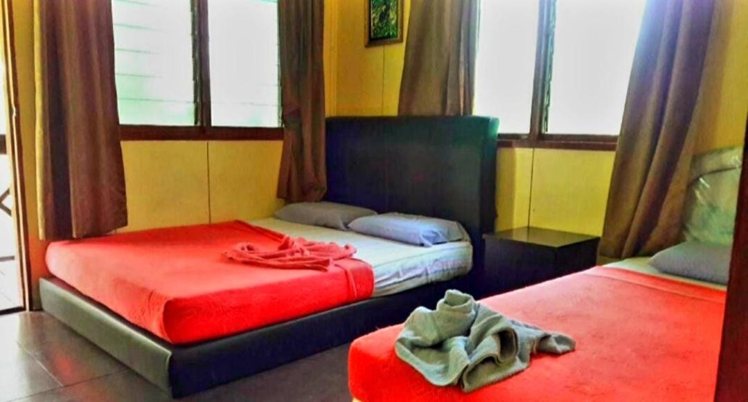 Sukau Backpackers B&B Экстерьер фото